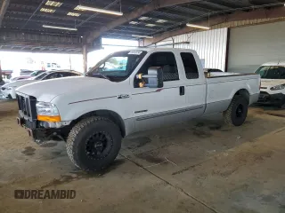 1999 Ford Super Duty F-250 XL with VIN 1FTNX20F0XEE02454, listed as a Copart auction lot 84049154 with 227,005 mi miles and Salvage Title. Bid and sale history available at carsss.com. Image 1.