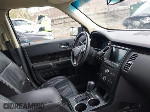 2016 Ford Flex SEL z VIN 2FMGK5C82GBA21945, wystawiony jako IAAI lot #42206498 z przebiegiem 141 320 mil mil oraz . Historia ofert i sprzedaży dostępna na DreamBid. Obrazek 5.