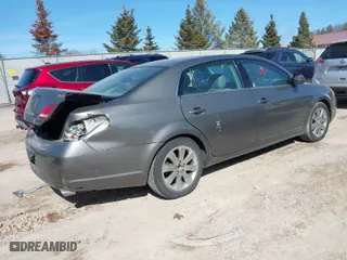 2005 Toyota Avalon XL with VIN 4T1BK36B65U027633, listed as a IAAI auction lot 41769335 with 89,904 mi miles. Bid and sale history available at carsss.com. Image 4.