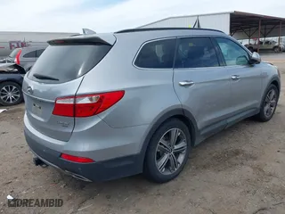 2014 Hyundai Santa Fe Limited with VIN KM8SR4HF5EU076887, listed as a IAAI auction lot 41900374 with 124,346 mi miles. Bid and sale history available at carsss.com. Image 4.