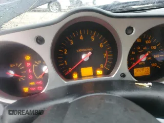 2004 Nissan 350Z Touring with VIN JN1AZ34D04T160475, listed as a Copart auction lot 59435035 with 122,875 mi miles and Salvage title. Bid and sale history available at DreamBid. Image 9.