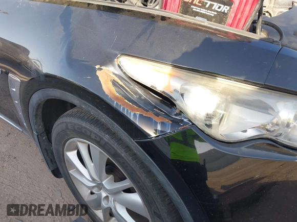 2014 Infiniti QX70 with VIN JN8CS1MU5EM450712, listed as a IAAI auction lot 41734354 with 164,349 mi miles and . Bid and sale history available at DreamBid. Image 6.