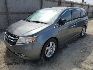 2013 Honda Odyssey Touring with VIN 5FNRL5H91DB039556, listed as a Copart auction lot 66198115 with 165,860 mi miles and Salvage title. Bid and sale history available at DreamBid. Image 1.