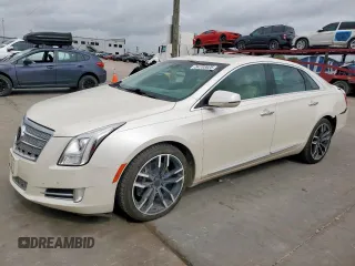 2013 Cadillac XTS Platinum z VIN 2G61U5S39D9219406, wystawiony jako Copart lot #54703025 z przebiegiem 140 815 mil mil oraz Szkoda całkowita • Salvage title. Historia ofert i sprzedaży dostępna na DreamBid. Obrazek 1.