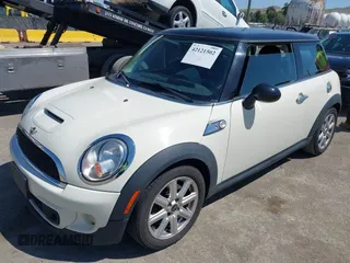2011 MINI Hardtop S with VIN WMWSV3C50BTY23450, listed as a IAAI auction lot 42121502 with 239,025 mi miles and . Bid and sale history available at DreamBid. Image 2.