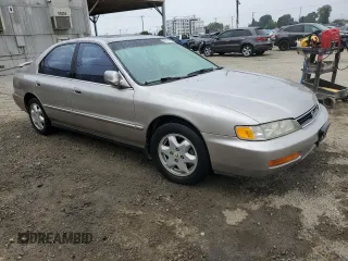 1996 Honda Accord EX с VIN 1HGCE6671TA003110, выставлен на аукционе Copart как лот 60751665 с пробегом 129 984 миль миль и Чистый • Clean title. История ставок и продаж доступна на DreamBid. Изображение 4.