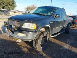 1997 Ford F-150 XL with VIN 1FTDX18W1VNB21383, listed as a IAAI auction lot 41378608 with 155,453 mi miles. Bid and sale history available at carsss.com. Image 2.
