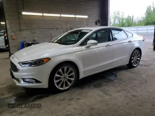 2017 Ford Fusion Titanium with VIN 3FA6P0D99HR138992, listed as a Copart auction lot 58421995 with 24,057 mi miles and Salvage title. Bid and sale history available at DreamBid. Image 1.