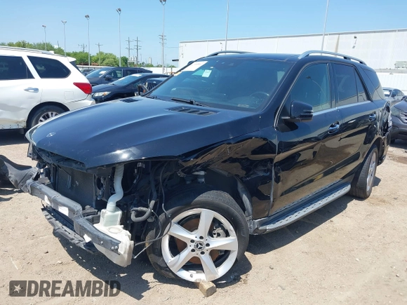 2018 Mercedes-Benz GLE 350 with VIN 4JGDA5JB0JB008547, listed as a IAAI auction lot 41985861 with 149,661 mi miles and . Bid and sale history available at DreamBid. Image 2.