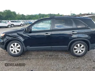 2013 Kia Sorento LX with VIN 5XYKTDA68DG408823, listed as a IAAI auction lot 42554361 with 221,917 mi miles and . Bid and sale history available at DreamBid. Image 14.