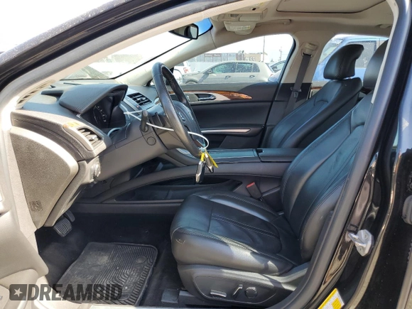 2014 Lincoln MKZ z VIN 3LN6L2GK0ER800286, wystawiony jako Copart lot #57644645 z przebiegiem 130 880 mil mil oraz Szkoda całkowita • Salvage title. Historia ofert i sprzedaży dostępna na DreamBid. Obrazek 7.