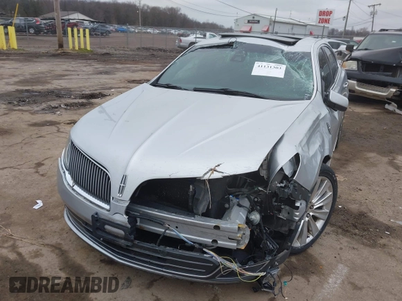 2013 Lincoln MKS EcoBoost with VIN 1LNHL9FT9DG611640, listed as a IAAI auction lot 41131303 with 135,550 mi miles and . Bid and sale history available at DreamBid. Image 6.