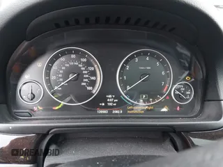 2014 BMW 5 Series 528i with VIN WBA5A5C5XED502261, listed as a IAAI auction lot 41418334 with 139,983 mi miles. Bid and sale history available at carsss.com. Image 7.