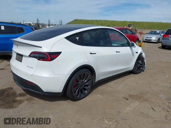 2021 Tesla Model Y Performance z VIN 5YJYGDEF7MF277769, wystawiony jako IAAI lot #42025157 z przebiegiem 28 522 mil mil oraz . Historia ofert i sprzedaży dostępna na DreamBid. Obrazek 4.
