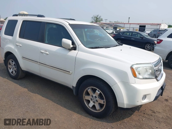 2011 Honda Pilot Touring z VIN 5FNYF4H9XBB003469, wystawiony jako IAAI lot #42369323 z przebiegiem 201 958 mil mil oraz . Historia ofert i sprzedaży dostępna na DreamBid. Obrazek 1.