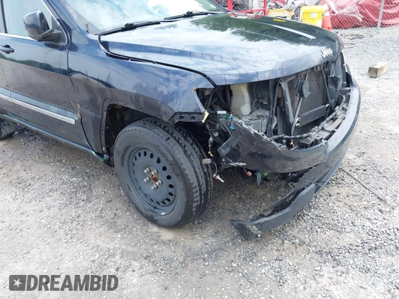 2011 Jeep Grand Cherokee Laredo with VIN 1J4RR4GG8BC543468, listed as a IAAI auction lot 42431481 with 224,639 mi miles and . Bid and sale history available at DreamBid. Image 17.