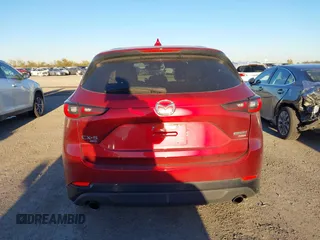 2022 Mazda CX-5 2.5 Turbo with VIN JM3KFBAY4N0564000, listed as a IAAI auction lot 41076013 with 25,106 mi miles and . Bid and sale history available at carsss.com. Image 16.