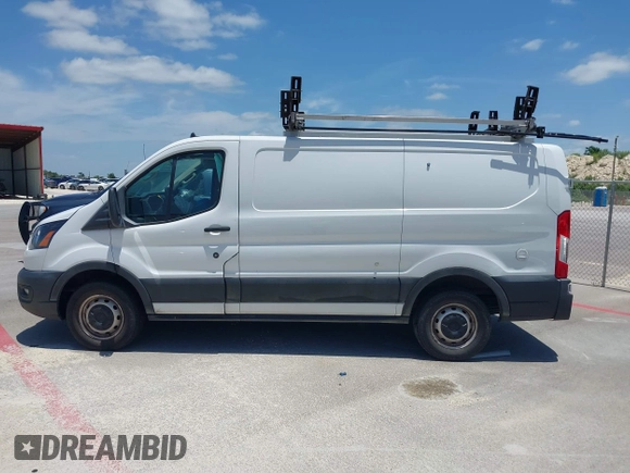 2020 Ford Transit Cargo z VIN 1FTBR1Y84LKA19741, wystawiony jako IAAI lot #42350802 z przebiegiem 90 186 mil mil oraz . Historia ofert i sprzedaży dostępna na DreamBid. Obrazek 13.