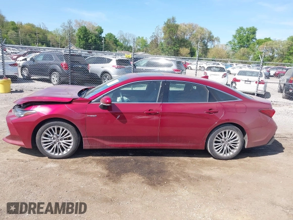 2021 Toyota Avalon Limited Hybrid z VIN 4T1DA1AB2MU008826, wystawiony jako IAAI lot #42220271 z przebiegiem 53 938 mil mil oraz . Historia ofert i sprzedaży dostępna na DreamBid. Obrazek 15.