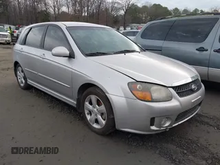 2008 Kia Spectra with VIN KNAFE161585012349, listed as a IAAI auction lot 41450025 with 167,695 mi miles. Bid and sale history available at carsss.com. Image 1.