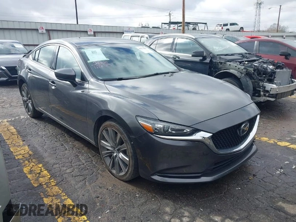 2021 Mazda 6 Grand Touring with VIN JM1GL1TY7M1609423, listed as a IAAI auction lot 41571966 with 80,485 mi miles. Bid and sale history available at carsss.com. Image 1.