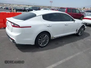 2018 Kia Stinger with VIN KNAE15LA8J6031125, listed as a IAAI auction lot 41928665 with 82,003 mi miles. Bid and sale history available at carsss.com. Image 4.