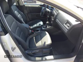 2012 Volkswagen Jetta TDI w/Premium & Nav with VIN 3VWLL7AJXCM426846, listed as a IAAI auction lot 42492125 with 127,342 mi miles and . Bid and sale history available at DreamBid. Image 5.