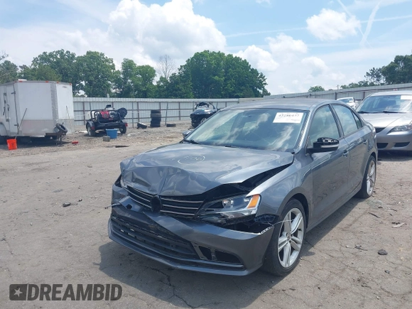 2014 Volkswagen Jetta SE with VIN 3VWD07AJ3EM232529, listed as a IAAI auction lot 42286442 with 125,000 mi miles and . Bid and sale history available at DreamBid. Image 2.
