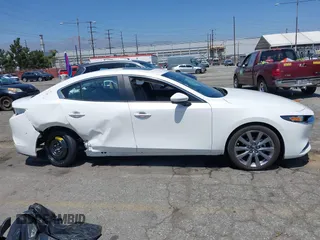 2024 Mazda 3 S Preferred with VIN 3MZBPACMXRM420901, listed as a IAAI auction lot 42101021 with 6,443 mi miles and . Bid and sale history available at DreamBid. Image 14.