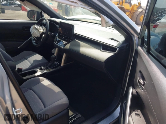 2023 Toyota Corolla Cross Hybrid S with VIN 7MUFBABG1PV014992, listed as a IAAI auction lot 42202656 with 18,913 mi miles and . Bid and sale history available at DreamBid. Image 5.