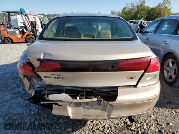 1997 Ford Escort LX with VIN 1FALP13P0VW403591, listed as a Copart auction lot 74321544 with 134,706 mi miles and Salvage Title. Bid and sale history available at DreamBid. Image 6.