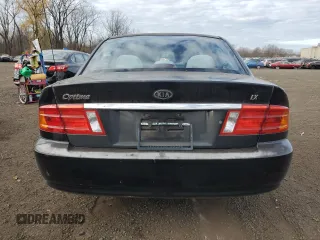 2001 Kia Optima LX z VIN KNAGD126315028712, wystawiony jako Copart lot #85302564 z przebiegiem 81 722 mil mil oraz Nie do naprawy • Non repairable. Historia ofert i sprzedaży dostępna na DreamBid. Obrazek 6.