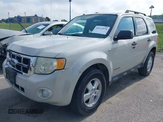 2008 Ford Escape XLT with VIN 1FMCU03178KA76736, listed as a IAAI auction lot 42672474 with 218,472 mi miles and . Bid and sale history available at DreamBid. Image 2.