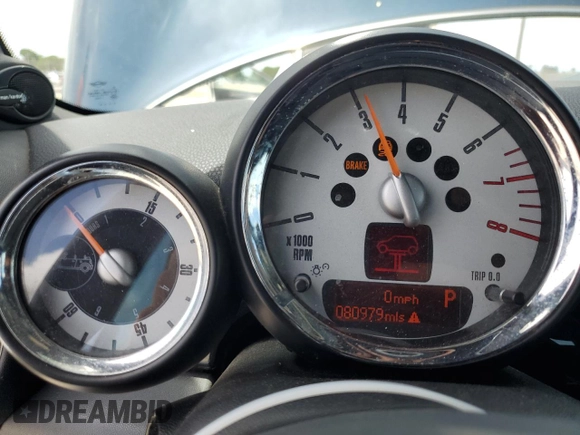 2011 MINI Convertible S with VIN WMWZP3C50BTX83220, listed as a Copart auction lot 61590205 with 80,979 mi miles and Salvage title. Bid and sale history available at DreamBid. Image 9.