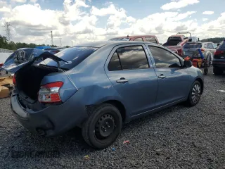 2009 Toyota Yaris z VIN JTDBT903X91297199, wystawiony jako Copart lot #57088615 z przebiegiem 161 170 mil mil oraz Szkody całkowita. Historia ofert i sprzedaży dostępna na DreamBid. Obrazek 3.