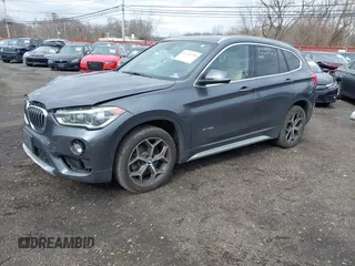 2017 BMW X1 xDrive28i with VIN WBXHT3Z39H4A57753, listed as a IAAI auction lot 41726790 with 52,509 mi miles. Bid and sale history available at carsss.com. Image 2.