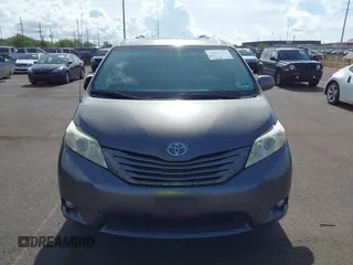2014 Toyota Sienna XLE with VIN 5TDYK3DC2ES438980, listed as a IAAI auction lot 42067750 with 143,728 mi miles and . Bid and sale history available at DreamBid. Image 12.