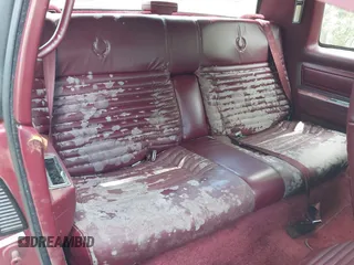 1990 Cadillac Eldorado z VIN 1G6EL1333LU608572, wystawiony jako IAAI lot #42191060 z przebiegiem 105 433 mil mil oraz . Historia ofert i sprzedaży dostępna na DreamBid. Obrazek 8.