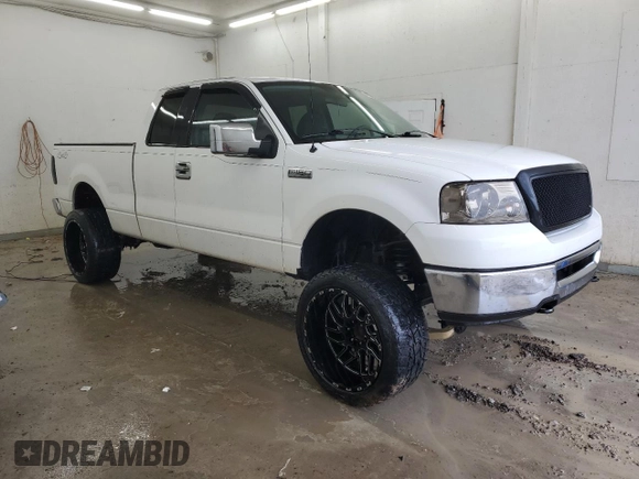 2006 Ford F-150 XLT with VIN 1FTPX14V06NB40275, listed as a Copart auction lot 47779085 with 147,077 mi miles and Salvage Title. Bid and sale history available at carsss.com. Image 4.