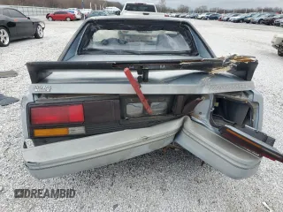 1989 Toyota MR2 z VIN JT2AW15C2K0146245, wystawiony jako Copart lot #87315874 z przebiegiem 162 741 mil mil oraz Tytuł czysty. Historia ofert i sprzedaży dostępna na DreamBid. Obrazek 6.