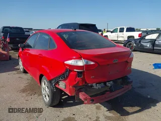 2014 Ford Fiesta SE with VIN 3FADP4BJ9EM174329, listed as a IAAI auction lot 42003743 with 86,744 mi miles. Bid and sale history available at carsss.com. Image 3.