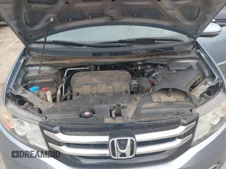 2014 Honda Odyssey Touring with VIN 5FNRL5H91EB081811, listed as a IAAI auction lot 42153920 with 16 mi miles and . Bid and sale history available at DreamBid. Image 10.