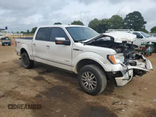 2011 Ford F-150 XLT with VIN 1FTFW1ET1BFD29677, listed as a Copart auction lot 54727835 with 155,367 mi miles and Salvage title. Bid and sale history available at DreamBid. Image 4.