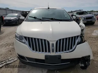 2012 Lincoln MKX z VIN 2LMDJ6JK8CBL06853, wystawiony jako Copart lot #54757735 z przebiegiem 114 046 mil mil oraz Szkoda całkowita • Salvage title. Historia ofert i sprzedaży dostępna na DreamBid. Obrazek 5.