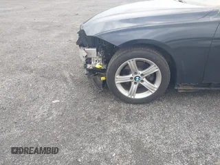 2015 BMW 3 Series 320i xDrive with VIN WBA3C3G5XFNT51305, listed as a IAAI auction lot 42023280 with 127,887 mi miles and . Bid and sale history available at DreamBid. Image 6.