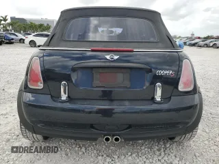 2006 MINI Convertible S z VIN WMWRH335X6TF87128, wystawiony jako Copart lot #51917565 z przebiegiem 91 741 mil mil oraz Szkoda całkowita • Salvage title. Historia ofert i sprzedaży dostępna na DreamBid. Obrazek 6.