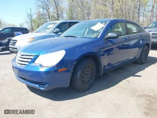 2009 Chrysler Sebring LX *Ltd Avail* with VIN 1C3LC46B59N503726, listed as a IAAI auction lot 42072108 with 148,650 mi miles. Bid and sale history available at carsss.com. Image 2.