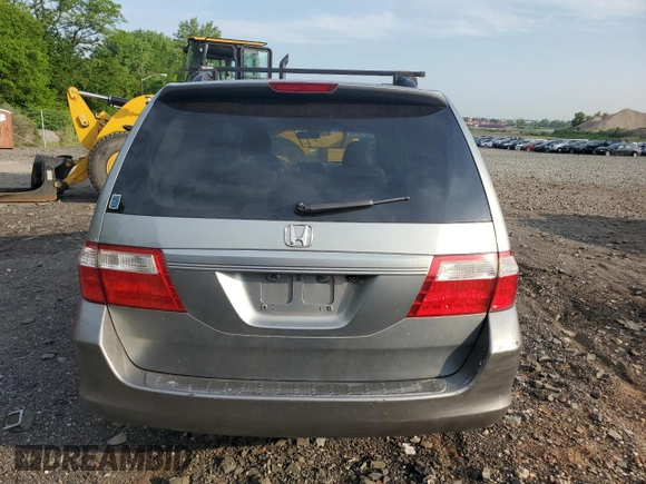 2006 Honda Odyssey EX-L z VIN 5FNRL386X6B031503, wystawiony jako Copart lot #59791425 z przebiegiem 138 624 mil mil oraz Czysty tytuł • Clean title. Historia ofert i sprzedaży dostępna na DreamBid. Obrazek 6.