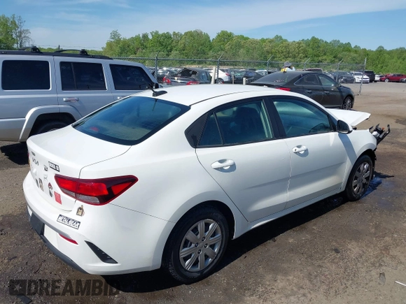 2022 Kia Rio S with VIN 3KPA24AD7NE492807, listed as a IAAI auction lot 42050520 with 100,756 mi miles. Bid and sale history available at carsss.com. Image 4.