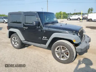 2009 Jeep Wrangler X with VIN 1J4FA24159L772540, listed as a Copart auction lot 62183815 with 179,628 mi miles and Salvage title. Bid and sale history available at DreamBid. Image 4.